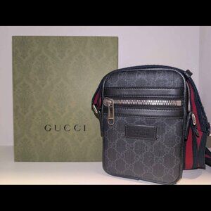 Gucci black GG supreme messenger bag